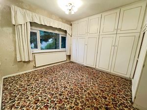 Bedroom One- click for photo gallery